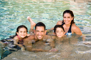 Jorge and Laura Posada with children