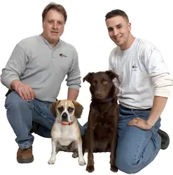 R. Dana Pest Control's K-9 Scent Detection Team: Richard Effaldana, Steven Effaldana, Walter the Puggle, and Lucy the chocolate lab-border collie mix