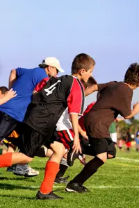 boys playing soccer; young boys playing sports; aftetr-school activities