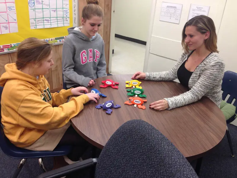 layla lindau with students at vincent smith school