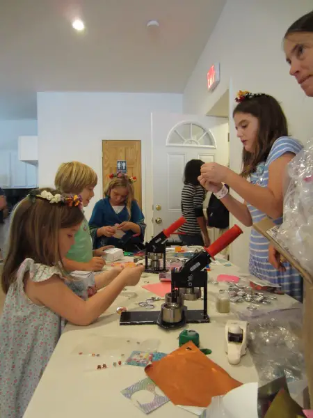 kids at a craft table