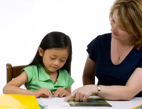 student working with tutor