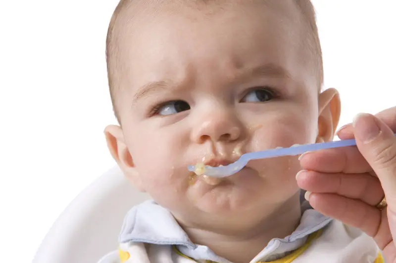 angry picky eater in high chair