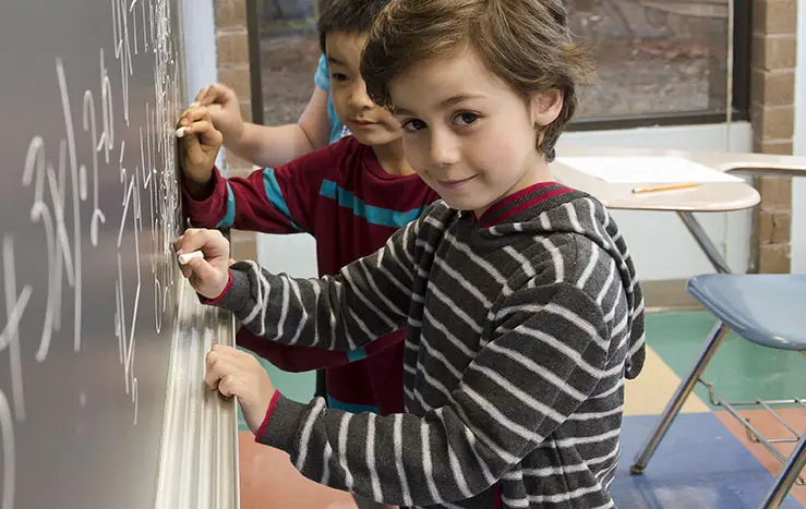 children at chalkboard